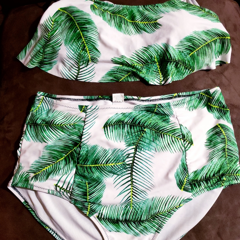 Two piece bathing suit in a green leaf print